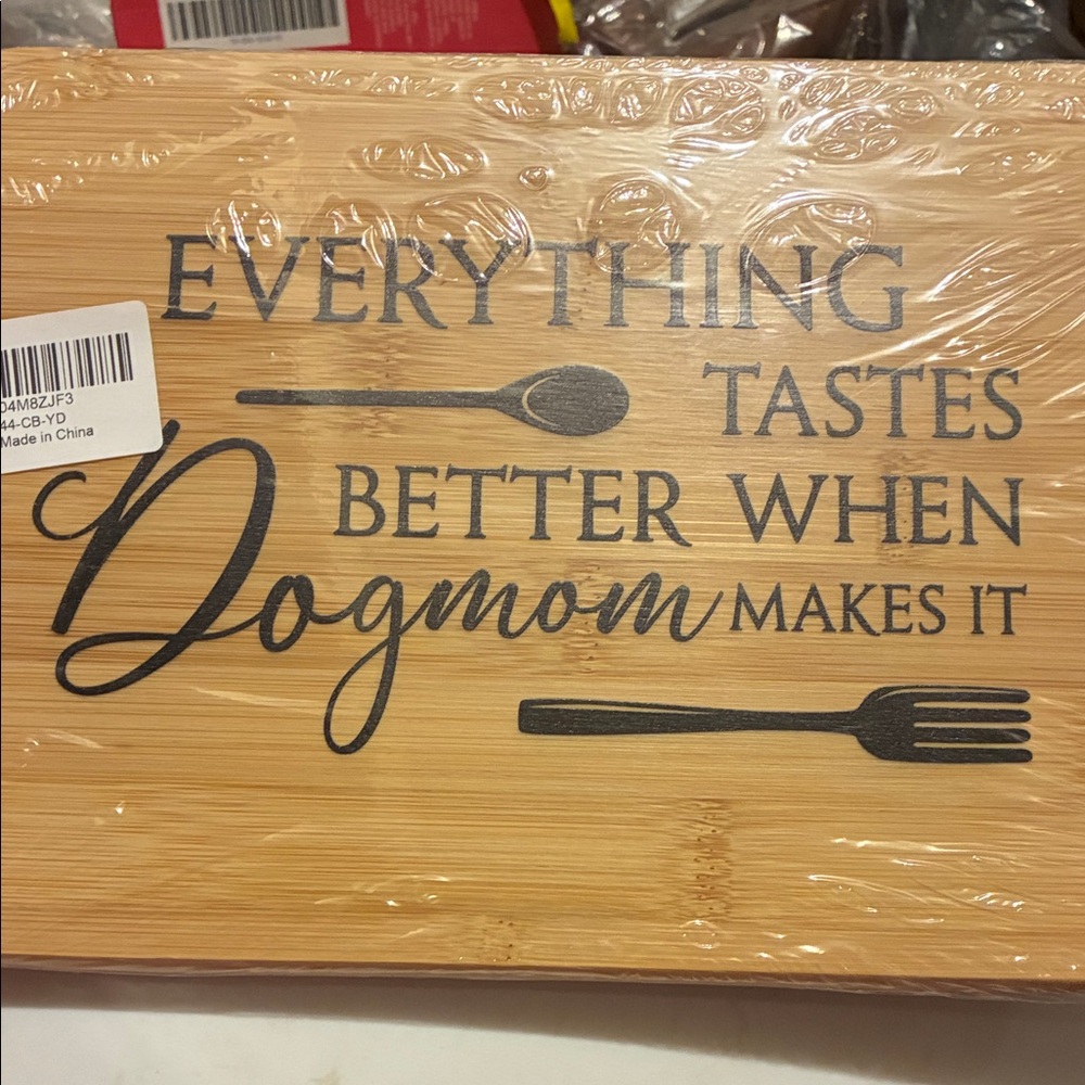 Bamboo Cutting Board with Black Writing and Utensil